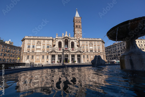 Basilica Papale di Santa Maria Maggiore catholic cathedral and fountain water reflection, Rome, Italy photo