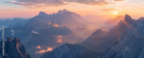 Sunset over majestic mountain peaks. photo