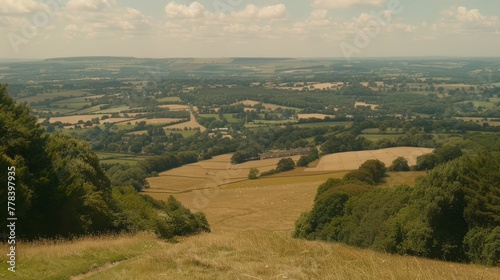  Top of hill, valley, lush green field, trees
