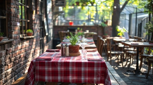 Red and White Checkered Tablecloth With Cups and Plate