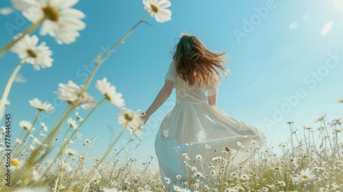 a happy woman in a light dress runs through a chamomile field against a clear sky AI generated photo