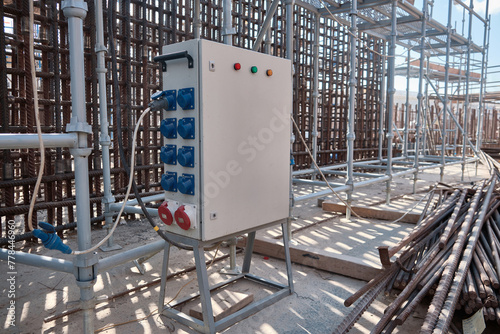 Industrial circuit breaker panel. Construction site electrical panel. Fuse box. Electrical distibution cabinet on site