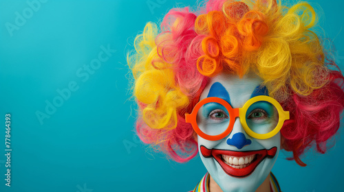 Vibrant Clown with Colorful Hair and Makeup, Perfect for Entertainment and Party Event Promotions