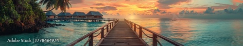Dock Leading to Beach With Sunset in Background