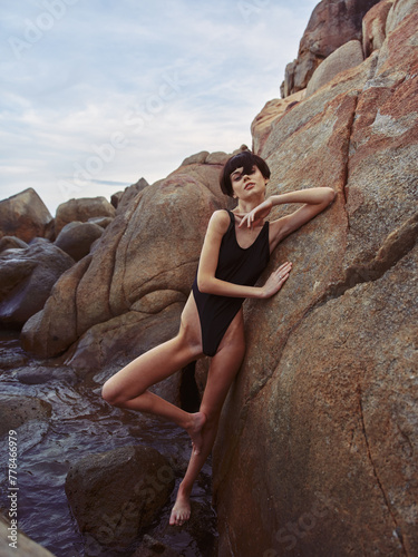 Sensational Summer: A Stunning Woman in Sexy Swimwear Embracing the Beach Paradise