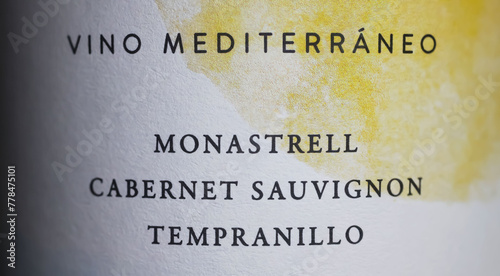 Spanish red wine bottle label with a list of Mediterranean grape varieties: Monastrell, Cabernet Sauvignon, Tempranillo