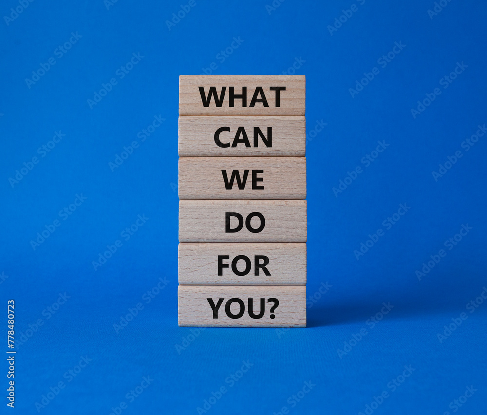 What can We do for you symbol. Wooden blocks with words What can We do for you. Beautiful blue background. Business and What can We do for you. Copy space.