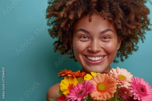 Woman Holding a Bunch of Flowers