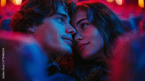 Man and Woman Sitting Together in a Theater