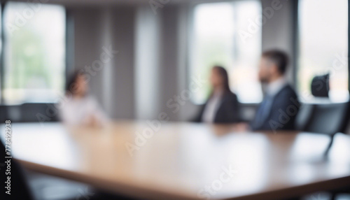 Blurred business people sitting in modern office conference room