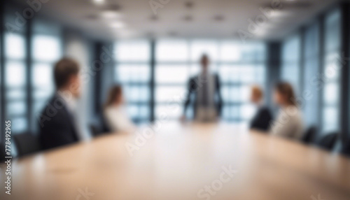Blurred executive business meeting in modern office boardroom