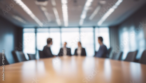 Blurred corporate meeting in modern boardroom office interior