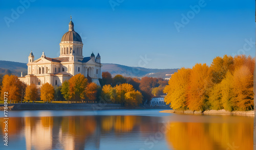 Esztergom, Hungary - Beautiful autumn morning with the Basilica of the Blessed Virgin Mary at Esztergom by the River Danube. Autumn colors and reflections of the Basilica are mirrored in water photo