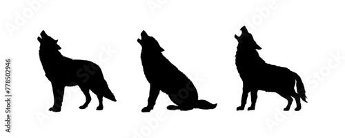 Set of  silhouette of a wolf howling at the moon