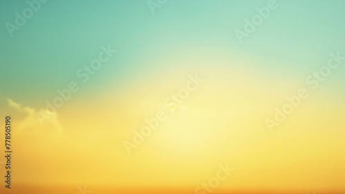 A blurred background featuring shades of mustard yellow blending into a soft sky blue,