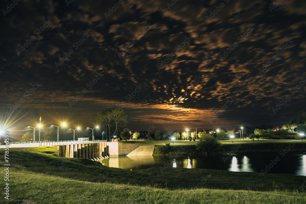 night on the river with starry sky and bridge night on the river with starry sky and bridge