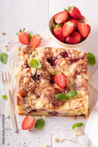 Sweet and delicious strawberry yeast cake baked at home.