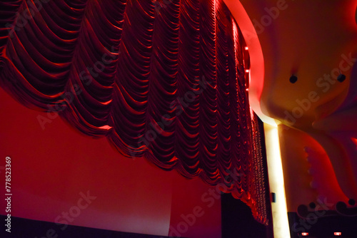 Raj Mandir Theater in Jaipur with illuminated red velvet looms