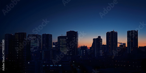 Skyline at night with building and lights on sunset orange and dark black sky background , Modern buildings in city against dark sky silhouette of skyscraper buildings in the city at night background
