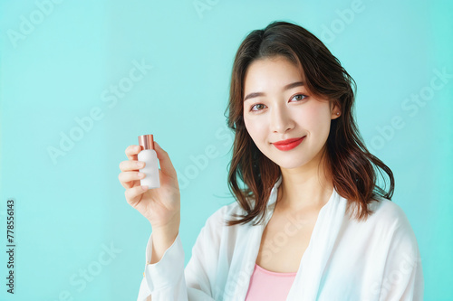 Young woman taking care of her skin