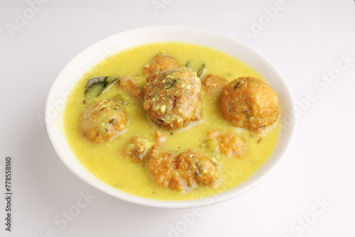 Kadhi Pakora, a Punjabi cuisine made with deep-fried fritters dipped in curd based curry with gram flour and spices