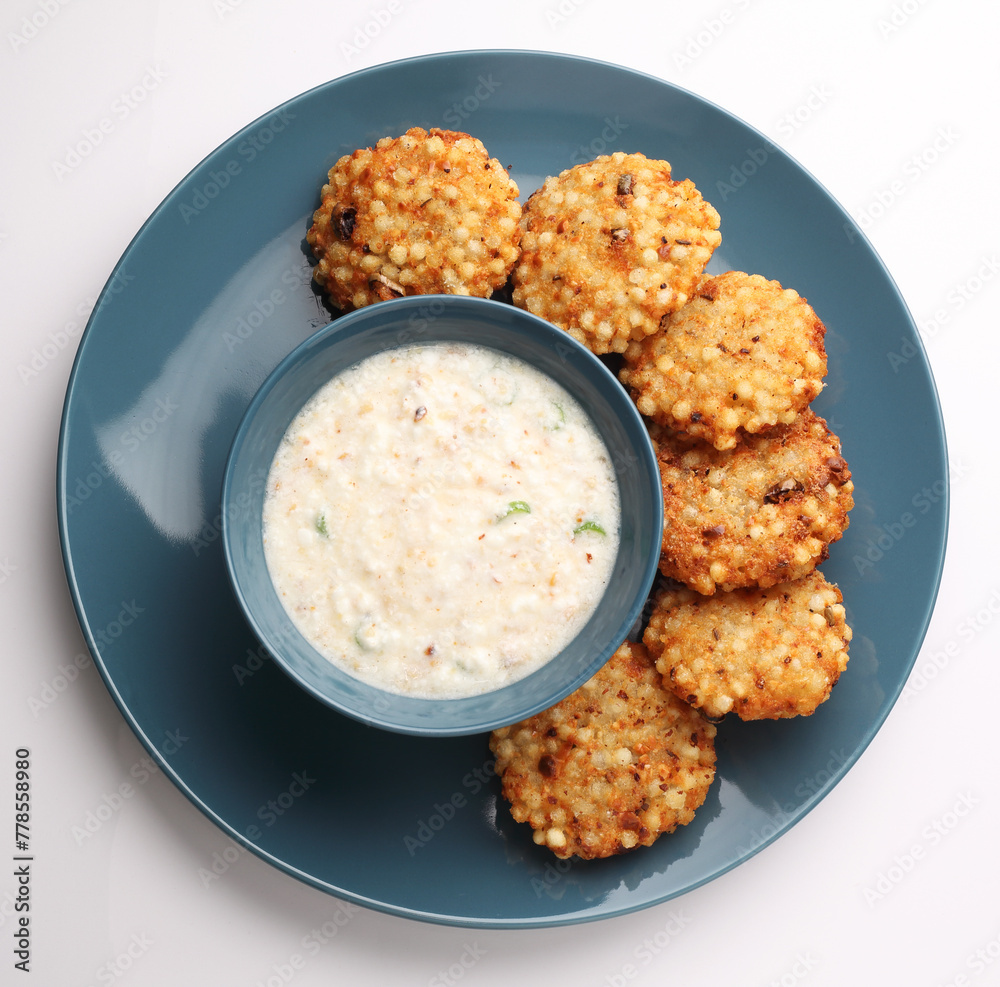 sabudana wada or shabudana vada called in india made from sago and served with chutney sabudana wada or shabudana vada called in india made from sago and served with chutney