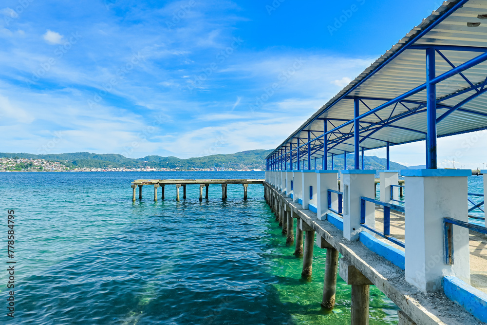 Ship harbor pier in Ambon bay, Indonesia Ship harbor pier in Ambon bay, Indonesia