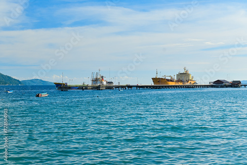 Fototapeta Naklejka Na Ścianę i Meble -  Ship harbor pier in Ambon bay, Indonesia