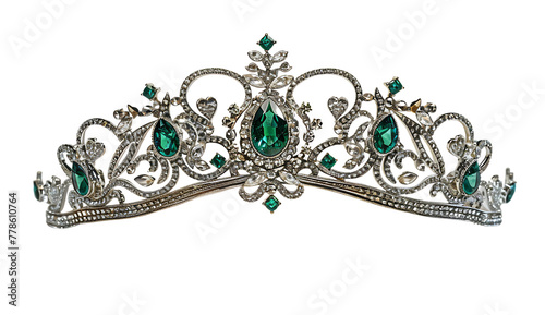 A silver tiara with emeralds on it, with very elegant shapes and small diamonds in the shape of hearts