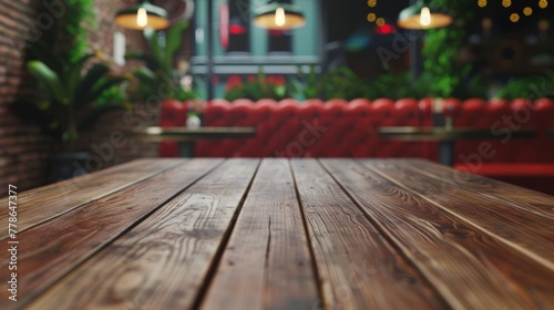 A wooden table in the foreground with red chairs in the background  creating a simple and inviting dining setup