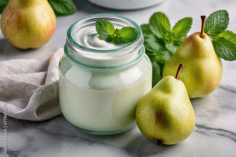 Yogurt or parfait with pear sauce and pears in glass jar on a white marble table, summer breakfast. Yogurt or parfait with pear sauce and pears in glass jar on a white marble table, summer breakfast.