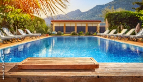 Tranquil Retreat: Empty Table with Swimming Pool in Blurred Background