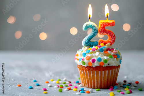 Birthday cupcake with number twenty-five candle photo