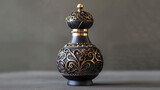 Exquisite perfume bottle with intricate pattern.