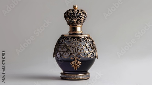 Exquisite perfume bottle with intricate pattern.