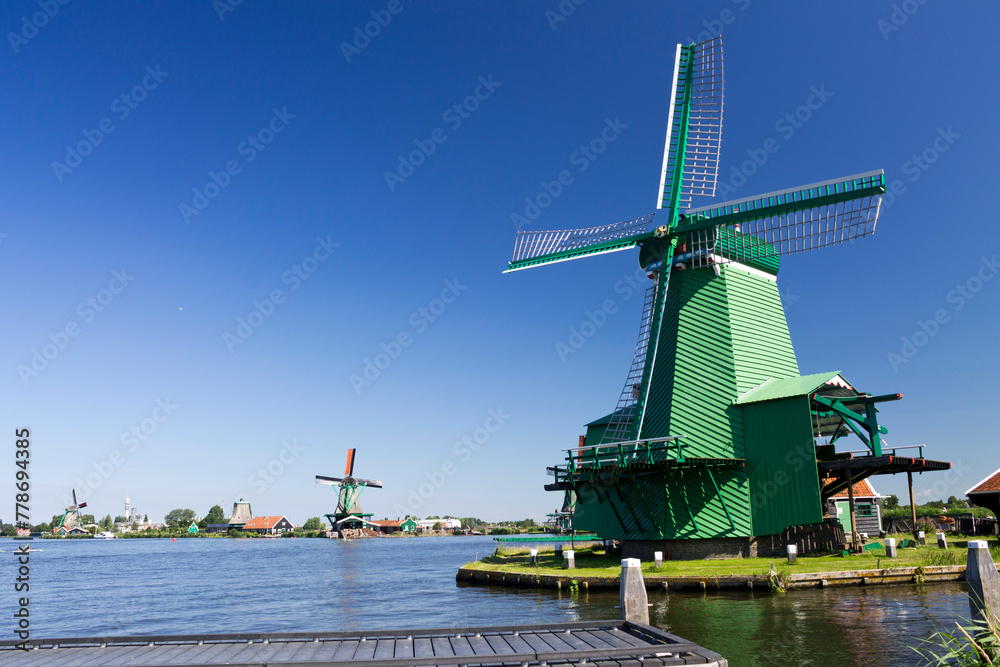 Green windmill in Zaanse Schans, Netherlands