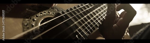  major chord closeup on acoustic guitar, dim room light, focus on hand, intimate feel photo