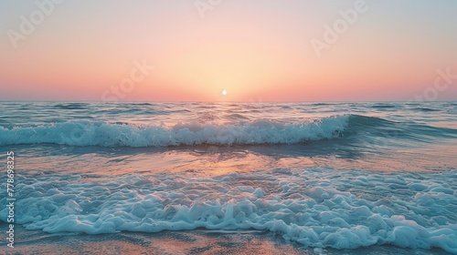 A tranquil sunrise casting soft hues over calm sea waves, embodying peacefulness and the beauty of nature. photo