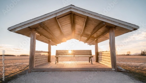 a wooden covered shelter with two benches and a window the bench is empty the shelter is on a white background