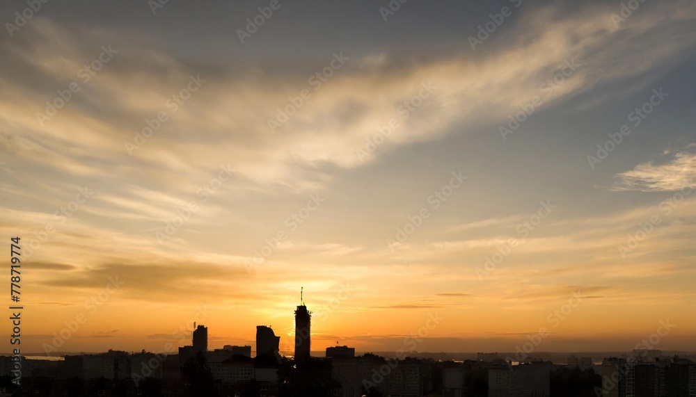 the beautiful color of the evening sky the view of the city s shadows in the evening the yellow sky when dusk comes