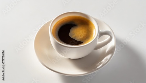 a hot cup of black espresso coffee from above in a white cup isolated against a white background generative ai