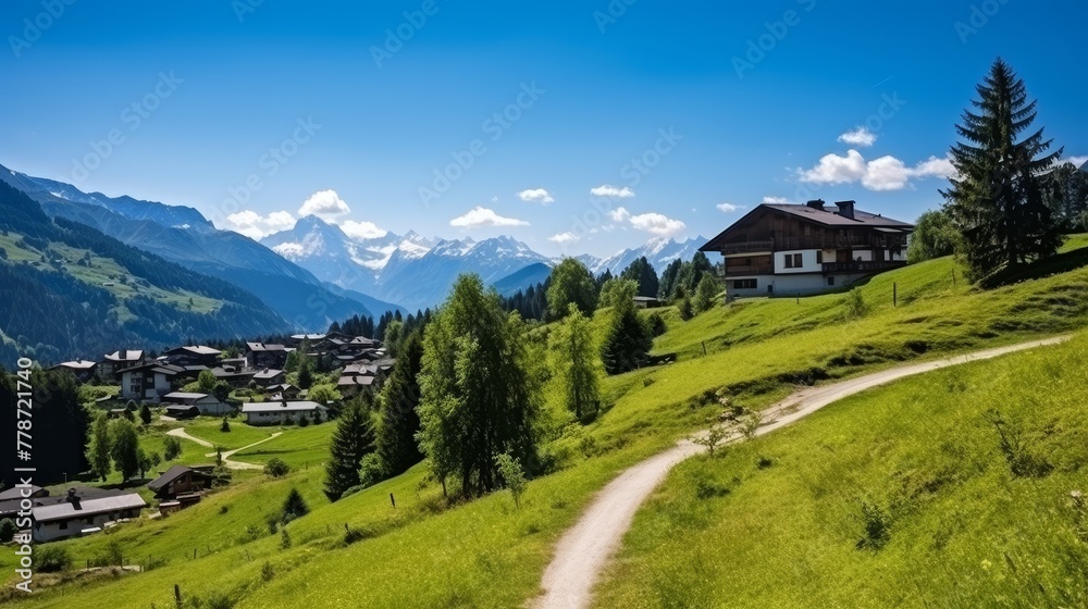 Modern cottage village in the summer Swiss Alps
