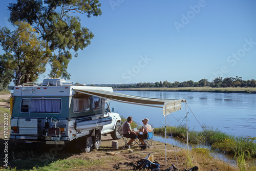 Modern Caravan Retreat with Retired Couple and Their Furry Friend by the Lake