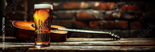 acoustic guitar and a glass of beer