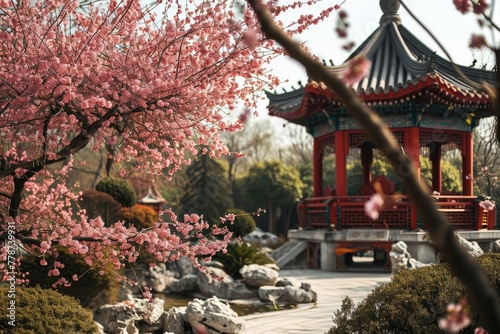 Chinese garden, A traditional Chinese garden with a red pagoda and cherry blossoms, AI-generated © Tanu