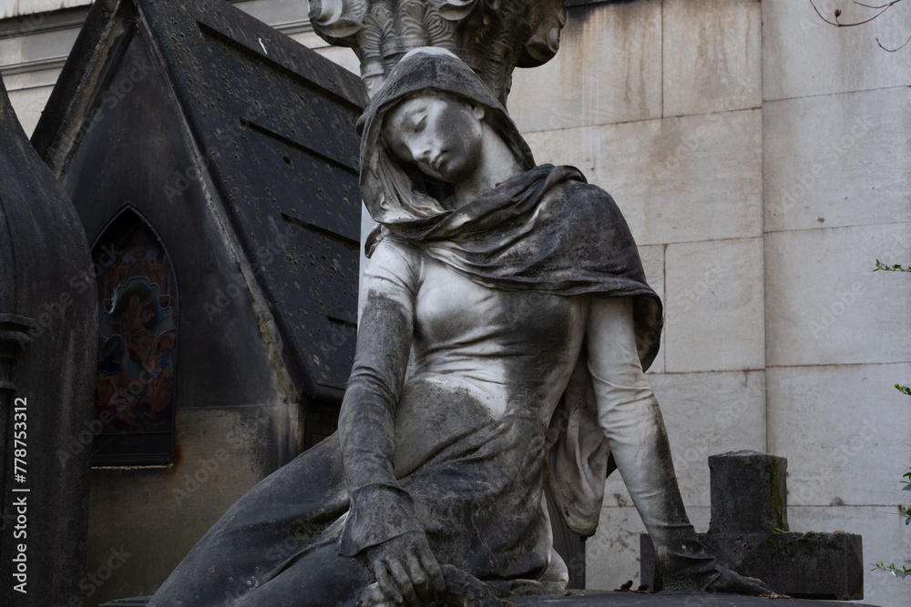 Monuments I've come across in the French cemeteries of Montparnasse and Pierre Lachaise (Paris).  Shot during days with diffuse lighting.