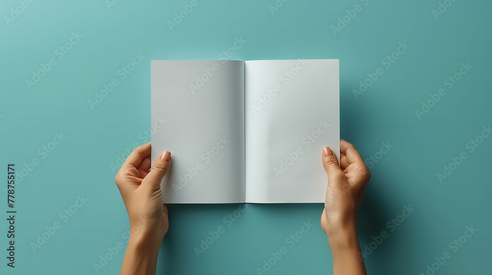 Holding a blank brochure mockup, Showcase your design with a blank brochure template image. Holding a blank brochure mockup, Showcase your design with a blank brochure template image.