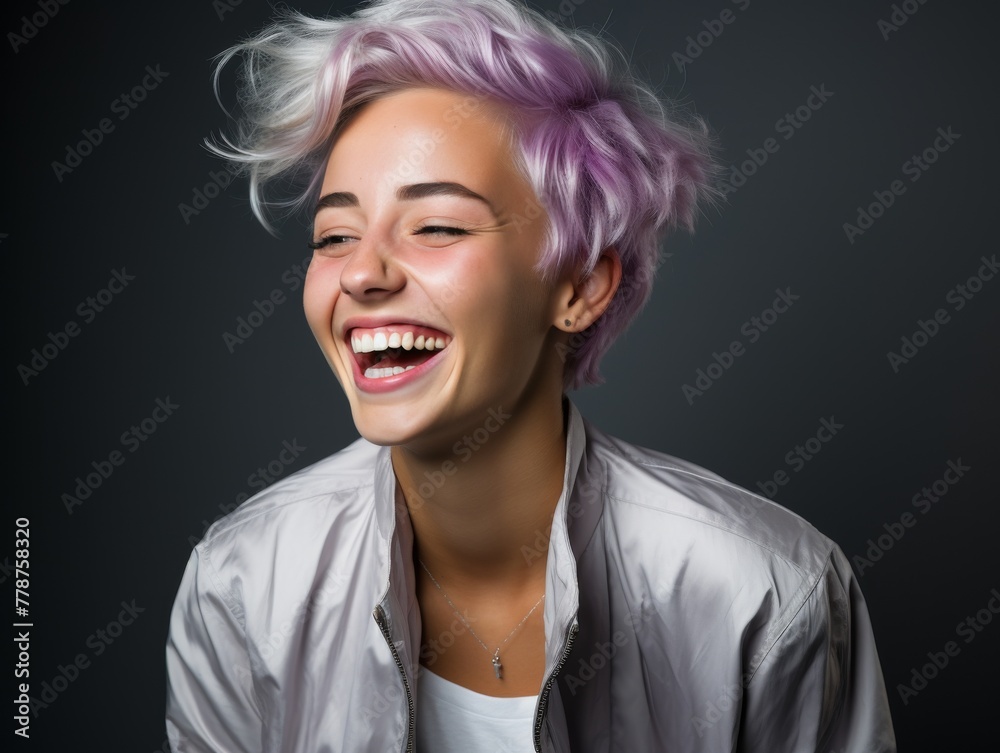Woman With Pink Hair Smiling and Wearing Silver Shirt