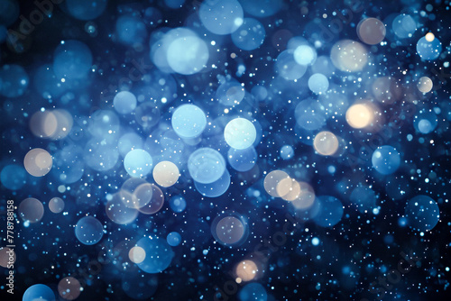 Blue background with white and blue specks that are illuminated creating star-like pattern.