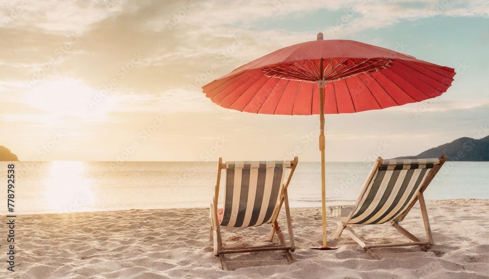 striped beach chair under red umbrella on sandy shore banner vacation background